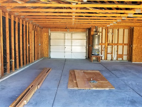 Comment l'autoconstruction d'un garage en ossature bois peut-elle simplifier et personnaliser la création d'espaces utiles ?